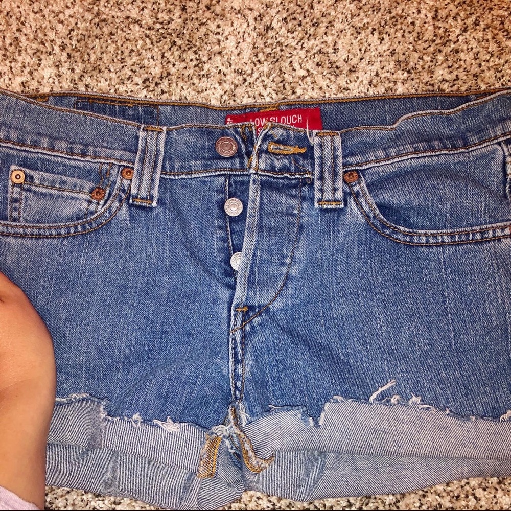 Size 3 LEVI denim distressed booty shorts